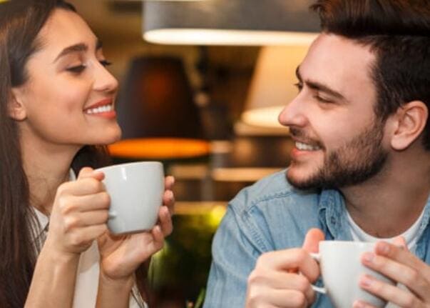 Couple having coffee representing community and conversation